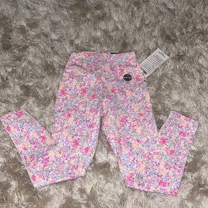 Pink ultimate work out leggings in floral print